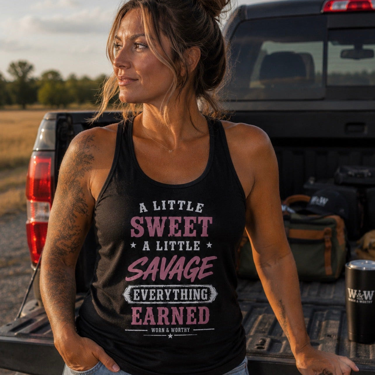 A Little Sweet. A Little Savage. Everything Earned. | Women’s Racerback Tank
